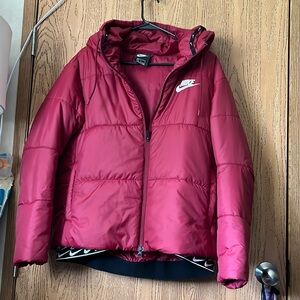 Nike puffer jackets. Excellent condition never worn it just tried it on.
